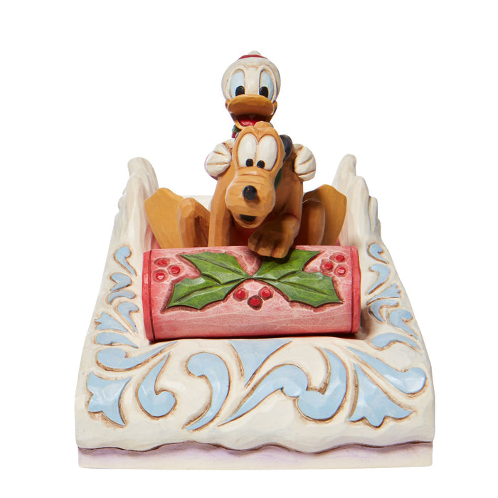 Donald and Pluto Sledding