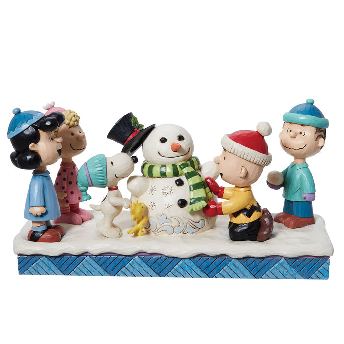 Peanuts Gang Building Snowman